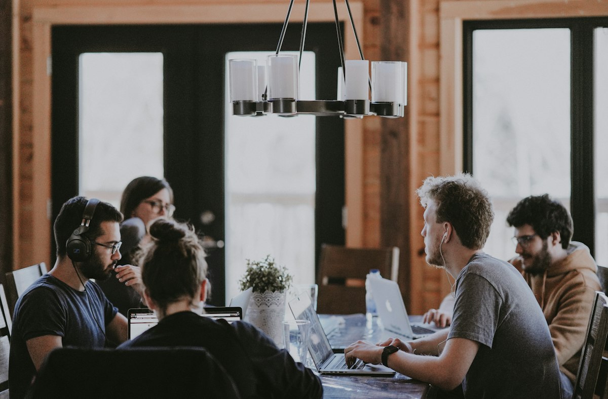 Professional team collaborating around a table